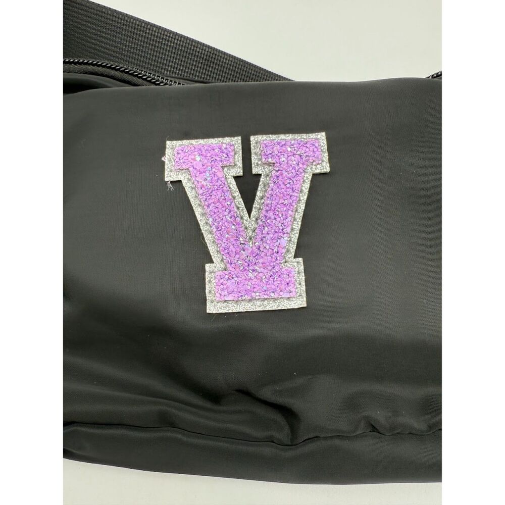 Fanny pack Black belt bag with a purple initial 'V' patch. - Picture 2 of 5